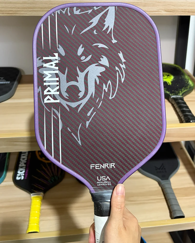 A high-performance pickleball paddle featuring a 3K carbon fiber weave surface, providing exceptional stiffness and a powerful strike for professional players.