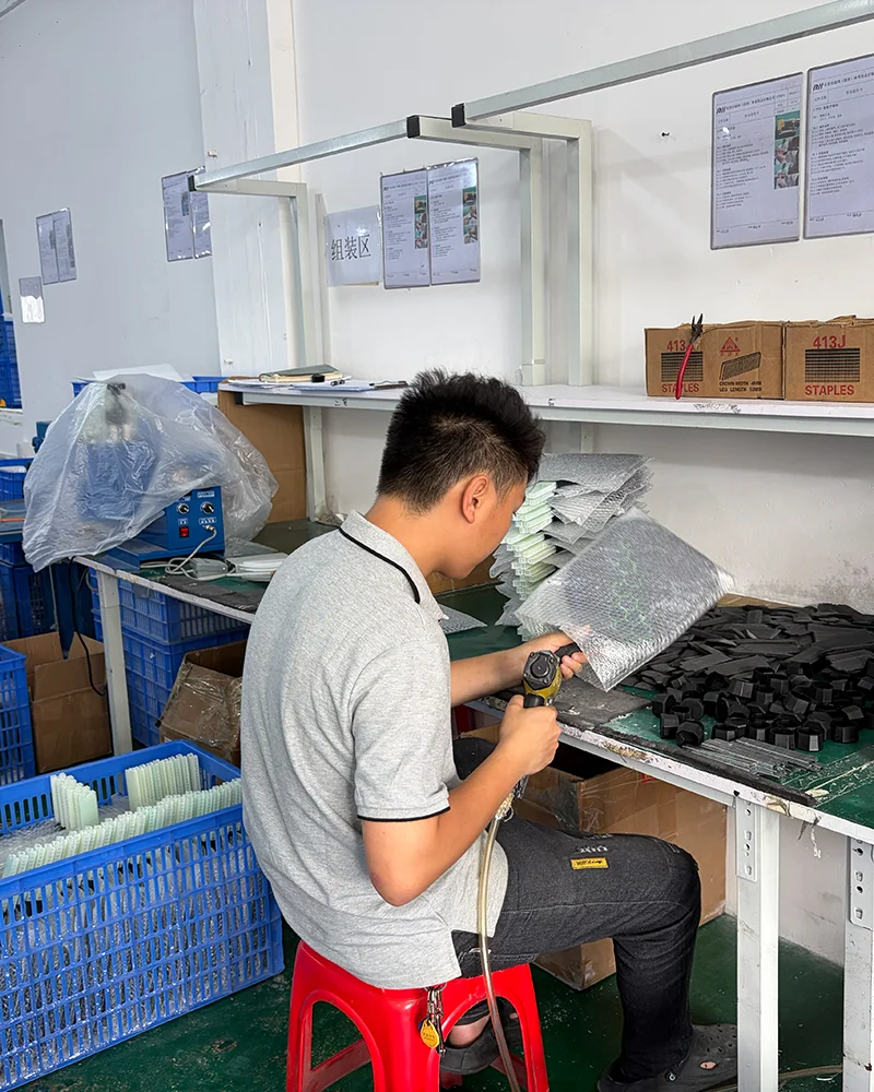 A technician carefully processing the pickleball paddle base to ensure a seamless handle integration and perfect ergonomic grip.